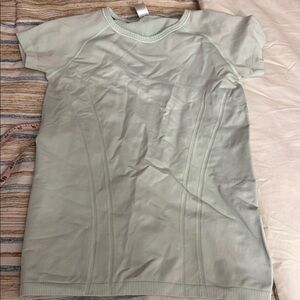 Like new! Ivivva Lululemon Mint Green Short Sleeve Tee